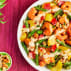 cajun shrimp stirfry on pink table